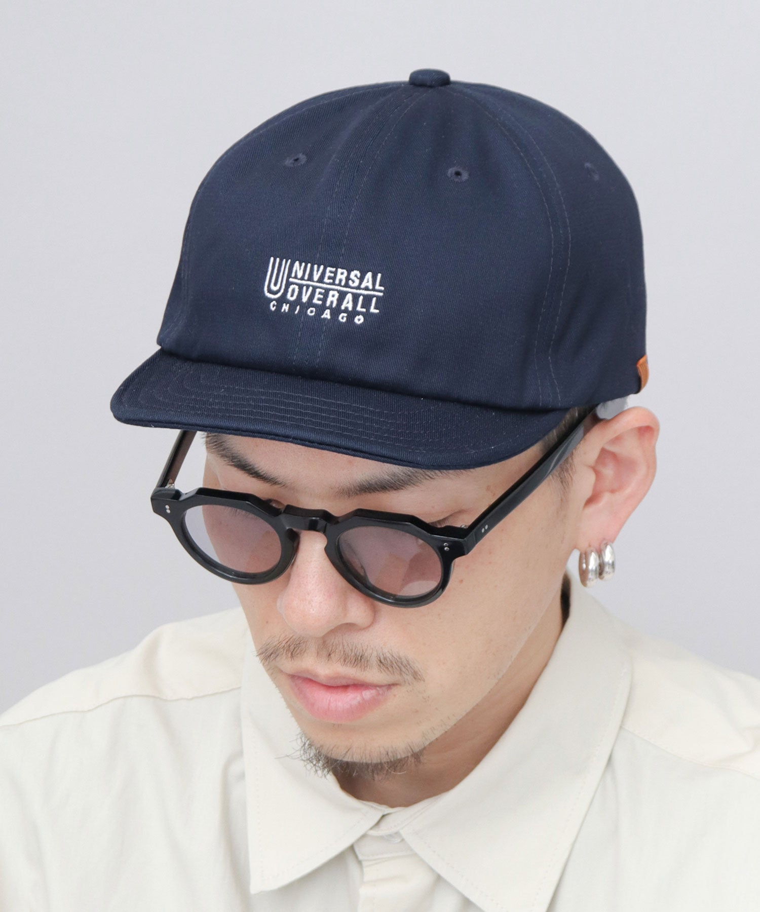 ユニバーサルオーバーオール UNIVERSAL OVERALL ロゴ刺繍 コットン ショートバイザーキャップ ショートブリム アンパイアキャップ （ブルー） ブルー